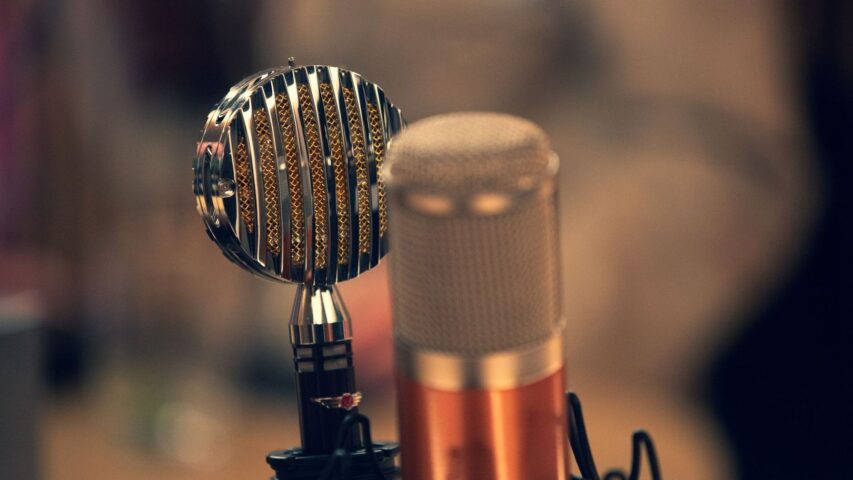 Vintage broadcast microphones evoking the sound of radio drama